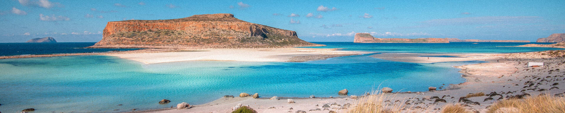 Plage aux eaux cristallines et rocher, Crète, Grèce, last minute Sunweb