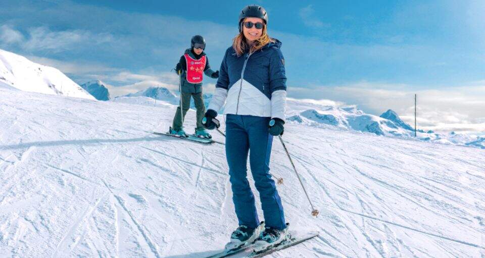 Ski on the slopes adult and kid