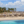 Strand met blauw water en palmbomen in Egypte, Marsa Alam